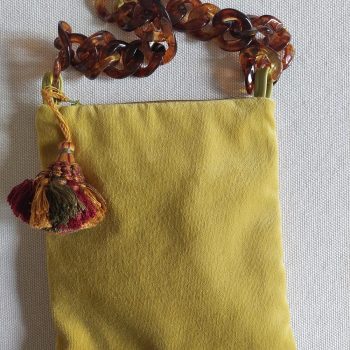 Bustina velluto vere acido con fiocco e catena